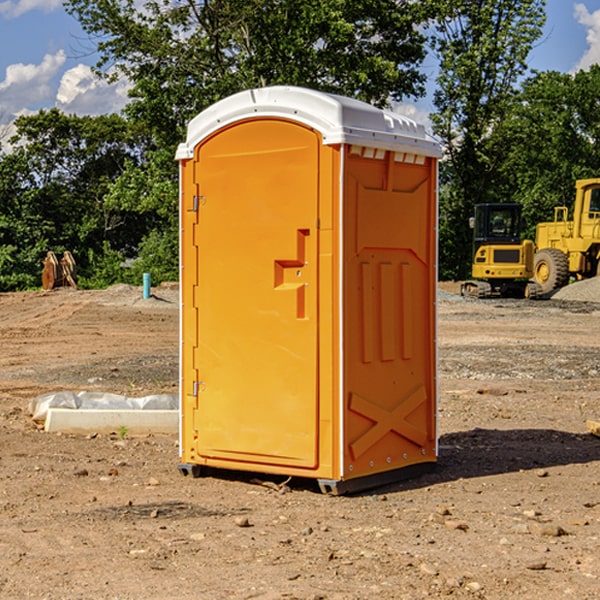 how often are the portable restrooms cleaned and serviced during a rental period in Langeloth